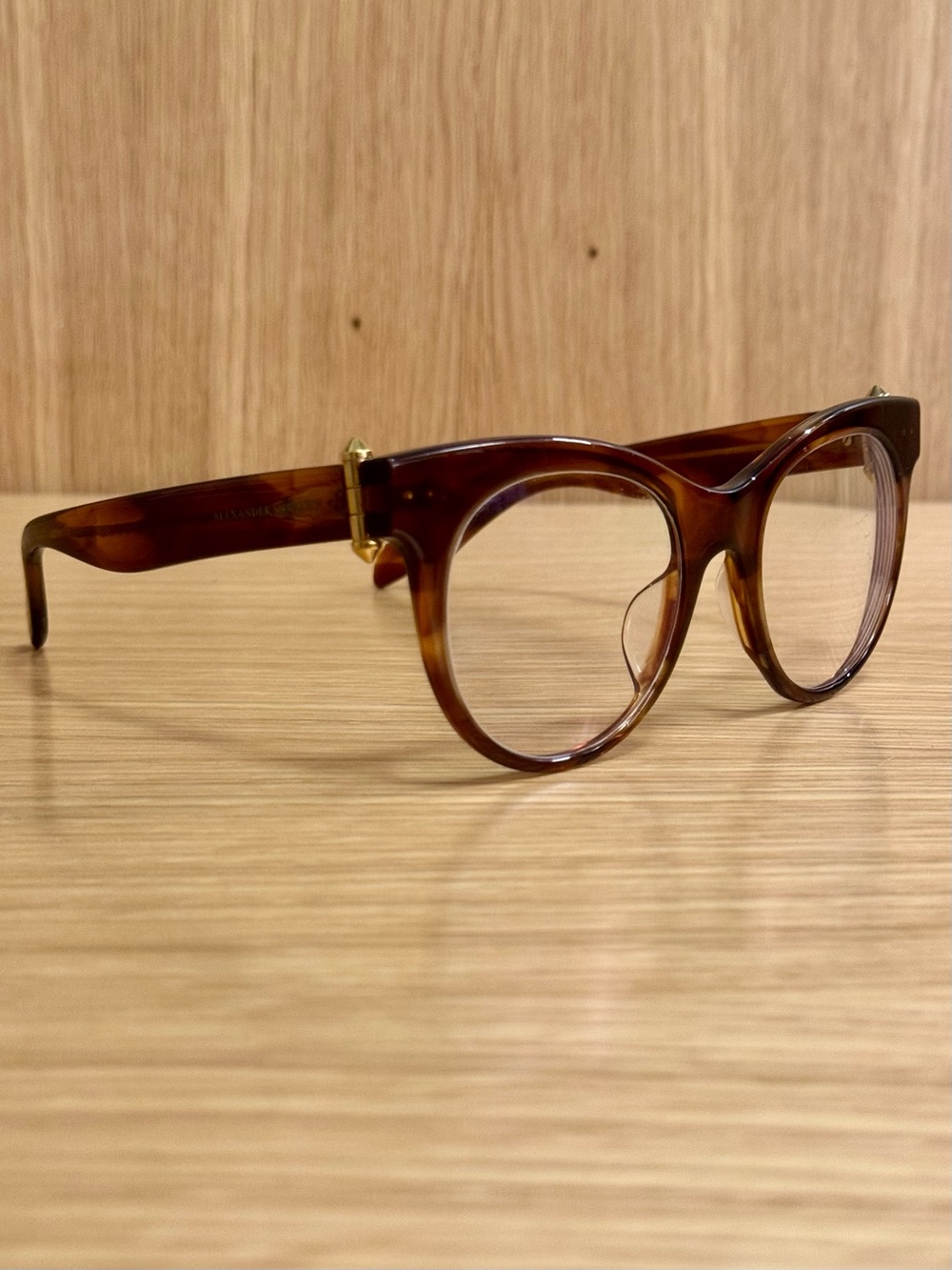 Alexander McQueen Tortoiseshell Cat-Eye Women’s Glasses with Gold Stud Accents